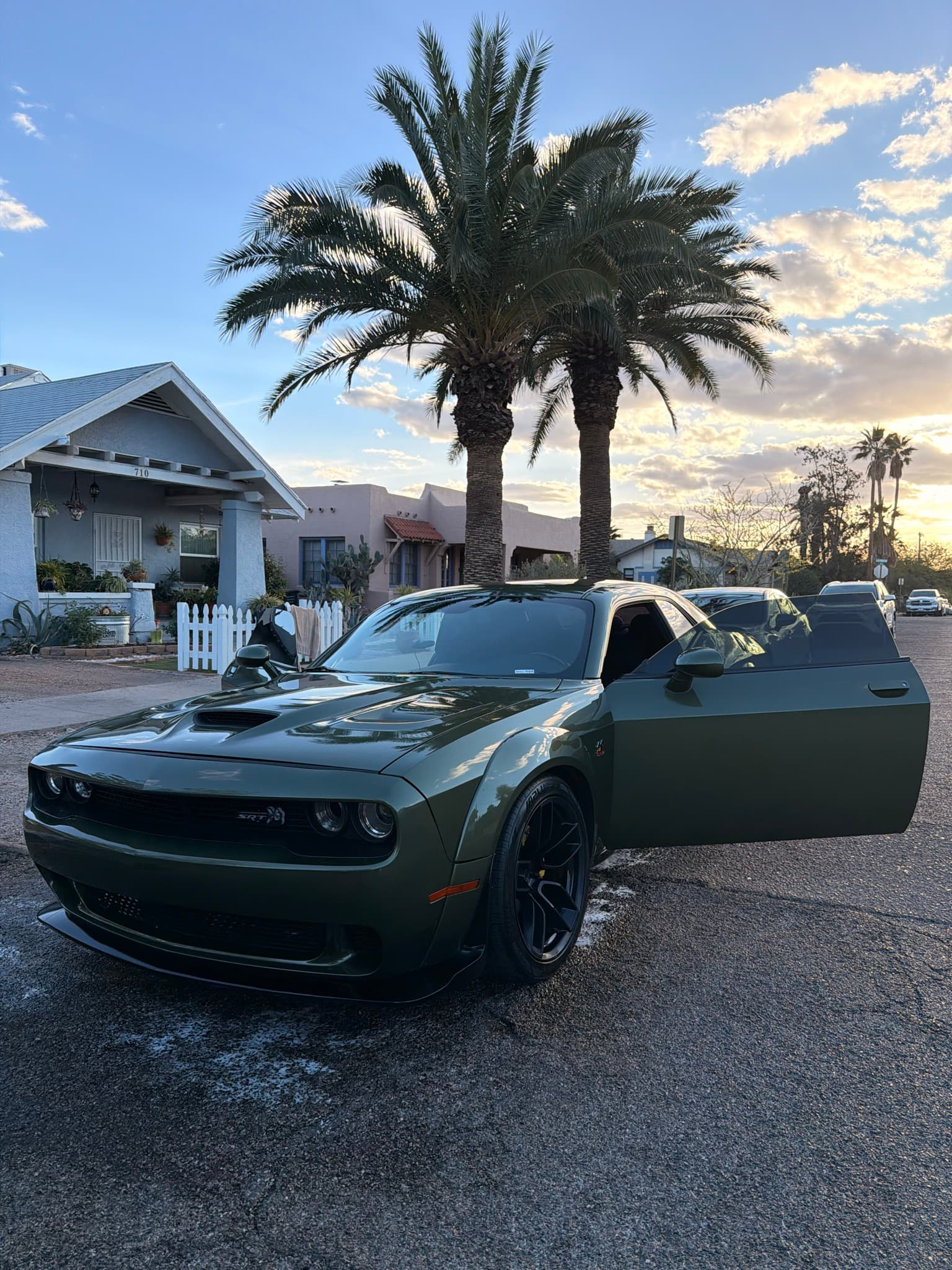 Dark green Dodge Challenger after full exterior detail — Tucson AZ